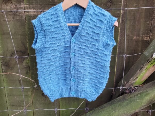 Child’s button up vest using caterpillar stitch in 8 ply knitting pattern - Image 7